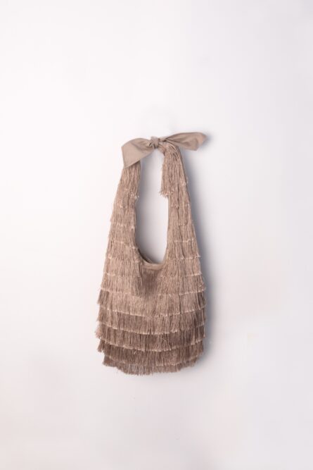 Beige bag fully covered with fringes